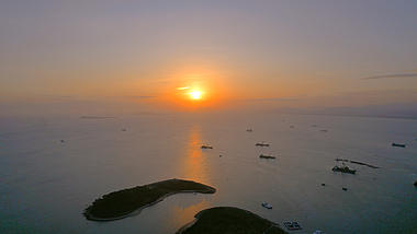 5.4K唯美航拍三亚鹿回头岛海上夕阳风光视频的预览图