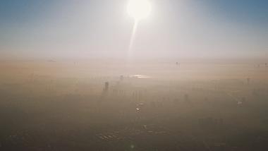 4K航拍城市平流层云雾云雾中的城市大厦视频的预览图